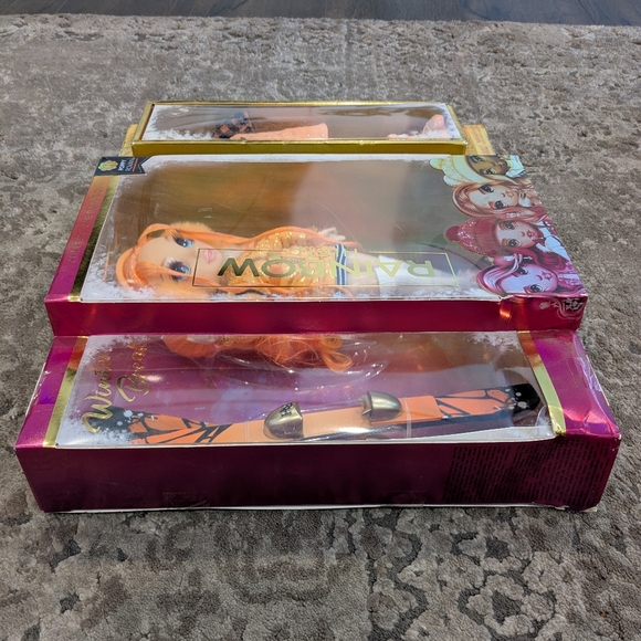 Rainbow High Winter Break Poppy Rowan Orange Fashion Doll and Playset - Picture 7 of 10